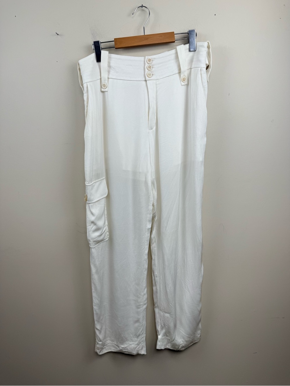 Chloé white silk cargo pants, featuring a distinctive three-button high waistban